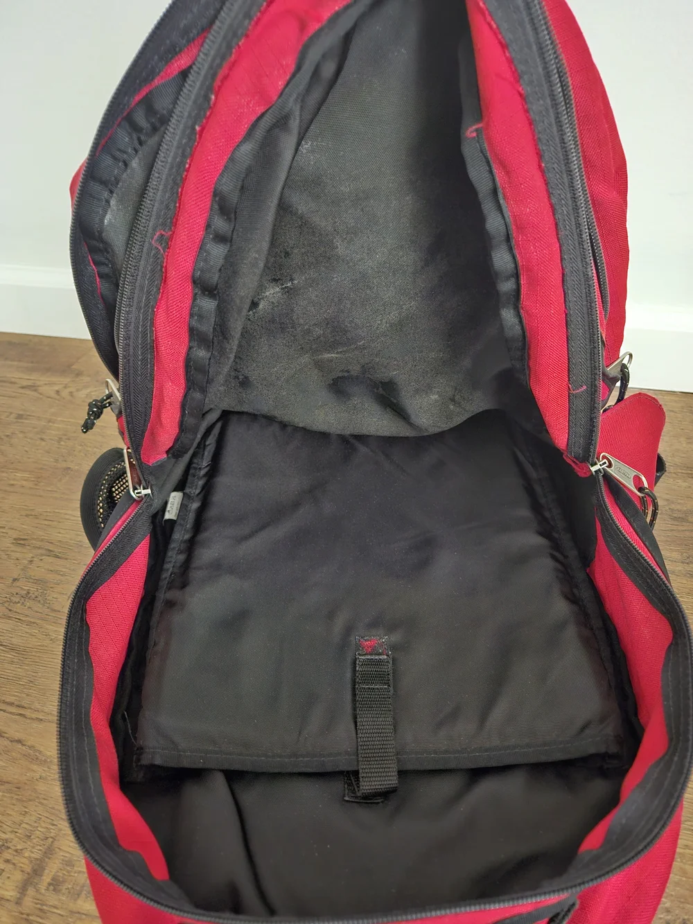 Eastpak Red and Black Backpack with Multiple Compartments